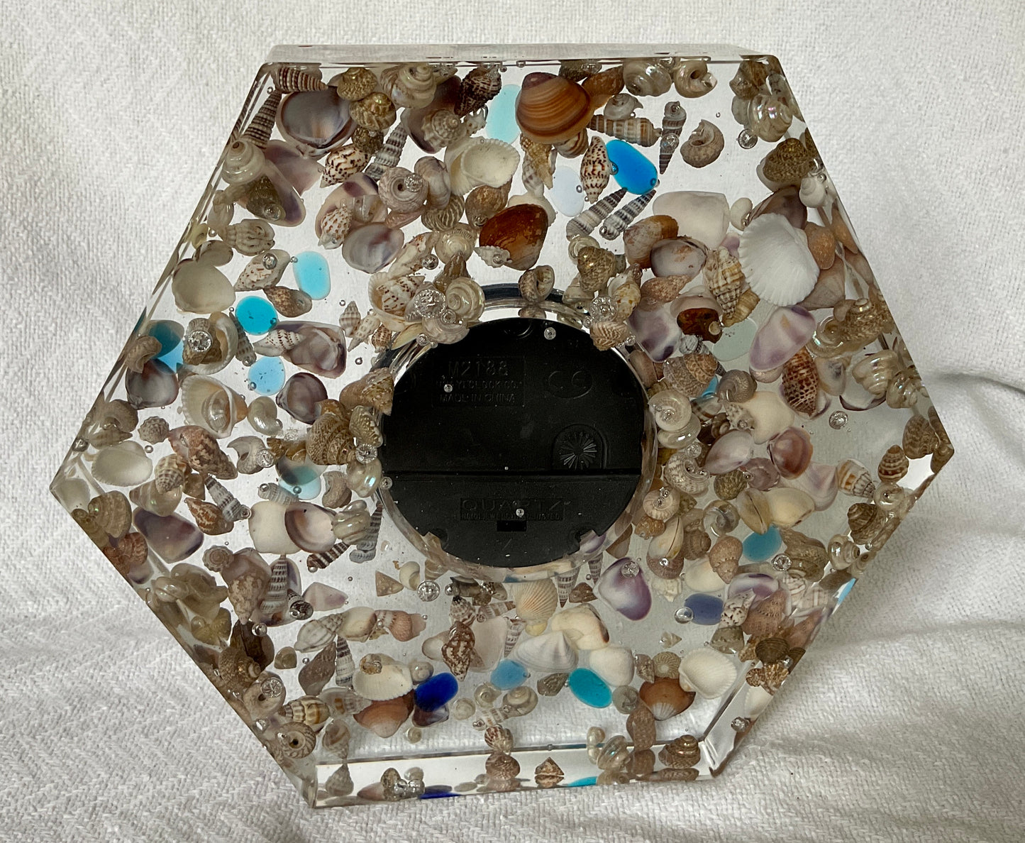 Sea shells and sea glass clear resin hexagonal clock